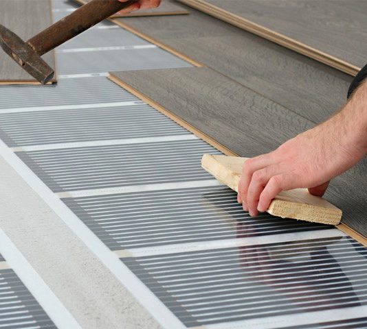 Кладут ли ламинат на теплый пол